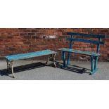 A garden bench, with slatted top, on a cast metal base in Coalbrookdale style,