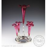 A silver plated and cranberry glass centrepiece epergne,