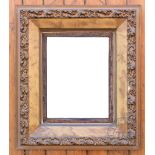 A large 19th century style rectangular carved gilt wood mirror, with central bevelled plated,