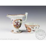 An 18th century Chinese export porcelain jug decorated to either side with a vignette within a