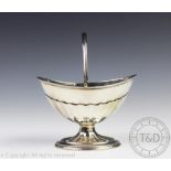 An Edwardian silver Adam style sugar basket, Atkin Brothers, Sheffield 1903,