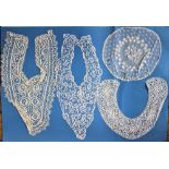 An assortment of 19th century assorted lace to include collars, flounces etc.