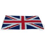 Two vintage linen United Kingdom Union Flags, early 20th century, each stitched in section,