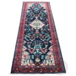 A Persian Srouk full pile wool runner,