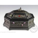 A mid 19th century ebonised octagonal box,