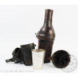 A 19th century vintage leather bottle case and cover and green glass wine bottle,