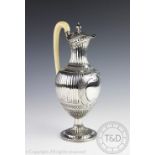 A George III silver ewer Henry Green London 1792, of elegant classical form and fluted detail,