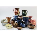 A collection of Ewenny pottery to include a selection of ewers, highest 15cm high,