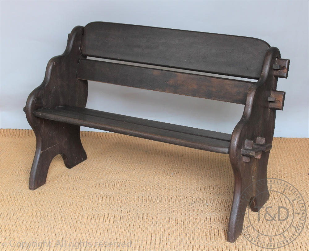 A garden bench made from Iroko wood by Branson of Ramsbury,