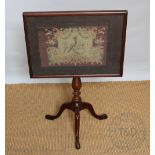 A George III style mahogany top table, the rectangular top inset with a needlepoint panel,