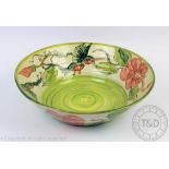 Paul Jackson; A studio pottery centre bowl decorated with humming birds and floral blossoms, 38.