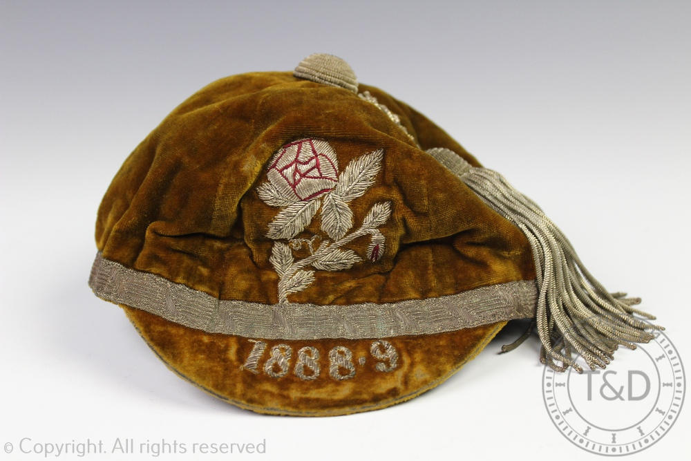 A 19th century Rugby cap - Yorkshire or Lancashire, decorated with a rose and dated 1888-9,