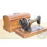 A vintage Fisher and Rossman sewing machine,