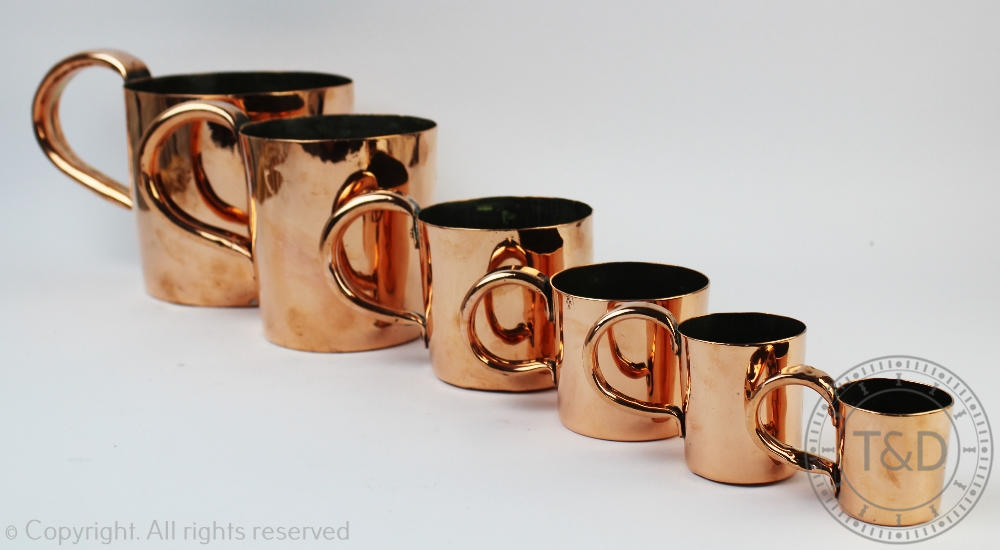 A part set of six 19th century graduated naval rum measures, each engraved with the military arrow,