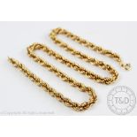 A 9ct yellow gold graduated rope twist chain and bolt ring clasp, gross weight 23.