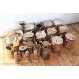 A selection of ex-military hollow wares, vases, sifters,