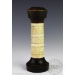 A Batak horn and bone lime container, Indonesian, the central bone section with carved detailing,