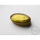 An Edwardian brass snuff box, of oval form and titled 'David Morris 1905 Coedpoeth',
