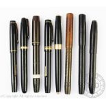 Eight assorted pens to include a Parker R 17 with a '14k' gold nib, a Waterman's 515 NM,