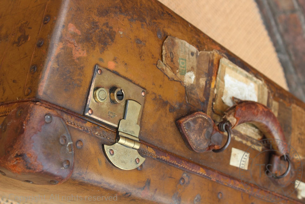 A vintage leather suitcase 'Orient Make', early 20th century, with travel labels, - Image 2 of 4