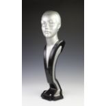 An Art Deco painted plaster female bust, probably a milliners shop display mannequin, unsigned,