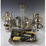 A quantity of silver plate to include a claret jug,