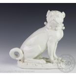 A 19th century German porcelain model of a seated pug,