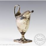 A George III silver helmet shaped cream jug, Peter & Ann Bateman, London 1795,