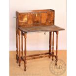 A 19th century teak Campaign style desk, with hinged top enclosing a fitted interior,