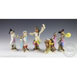 A five piece German porcelain monkey band comprising; a conductor, flautist, pianist,