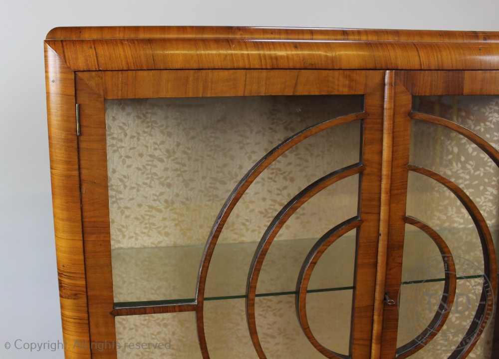 An Art Deco walnut display cabinet, with two glazed doors forming concentric circles, - Image 3 of 3