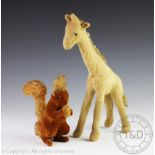 Two vintage Steiff toys, one modelled as a squirrel and the other as a giraffe,