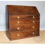 A George III mahogany bureau, with fall enclosing a fitted interior,