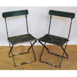 Three wood and metal folding garden chairs,