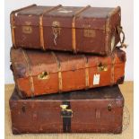 Three vintage canvas travelling trunks,