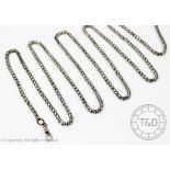 A white metal muff or guard chain, with pierced star deign and attach swivel clasp,