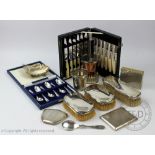 An assorted collection of silver and plate to include; a silver cigarette case, Birmingham 1942,