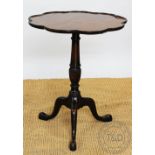 A George III style mahogany occasional table, with nonagonal shaped top, on tripod base,
