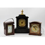 A French lacquered brass carriage time piece, with engraved presentation to the top,