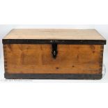 An early 20th Century wrought iron pine trunk of naval interest,