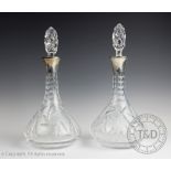 A pair of silver collared decanters and stoppers, ESC, Birmingham 1974,