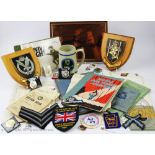 A small selection of World War II memorabilia, including two Royal Air Force exercise books,