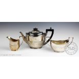 A Victorian three piece silver tea service, Elkington & Co, Birmingham 1886, each of oval,