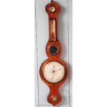 A late Victorian carved walnut aneroid barometer, 23cm diam,