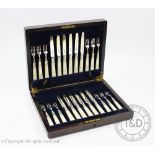 A cased set of twelve mother of pearl handled and silver fruit knives and forks,