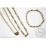 A yellow metal and cultured pearl set necklace and matching bracelet,