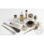 A selection of silver topped jars and accessories,