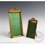 Two Edwardian gilt brass photograph frames,