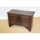An inlaid and carved oak six plank coffer, 18th century timbers and later,