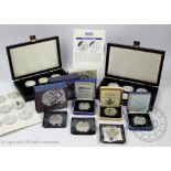 A collection of commemorative silver proof coins,